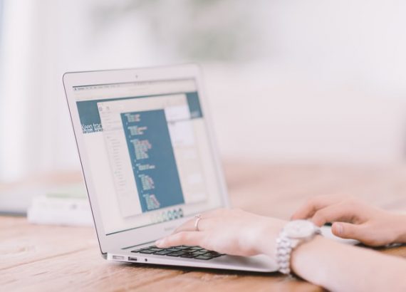 A photo of a blogger working on her pc